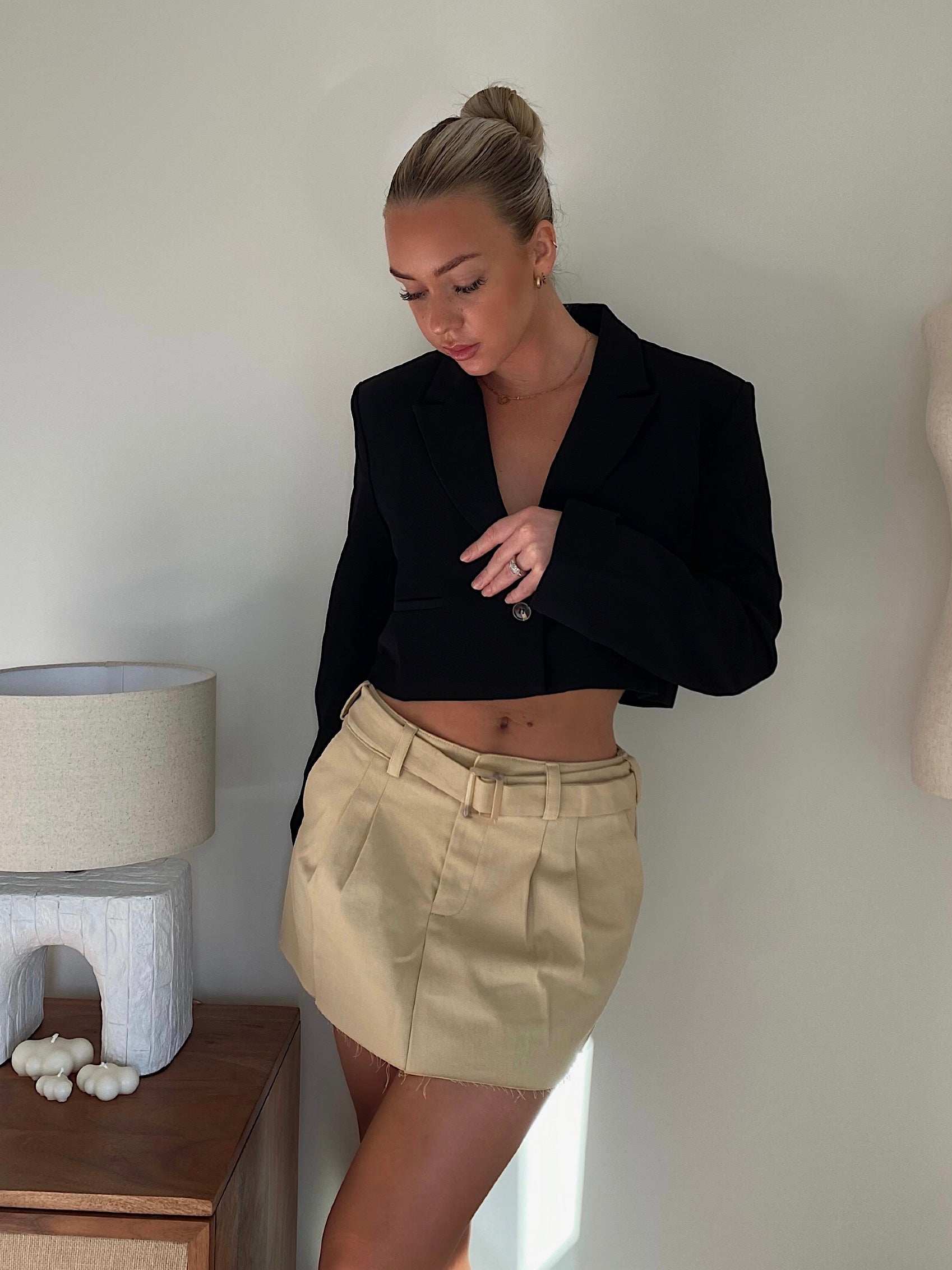 Cropped blazer. Oversized, boxy fit. Single breasted. Collar neckline. Long sleeves. Front button closure. Faux front pockets. Fully lined. Can be thrown over any item in your closet.